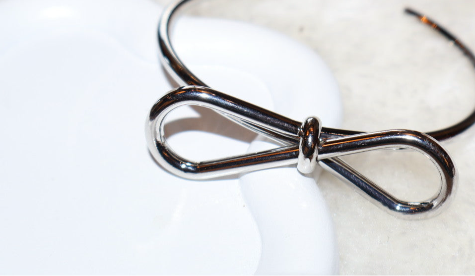 Bow-cuff bracelets
