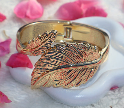Gold feather bangle