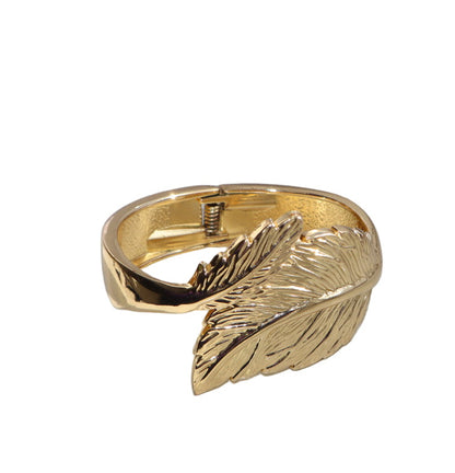 Gold feather bangle