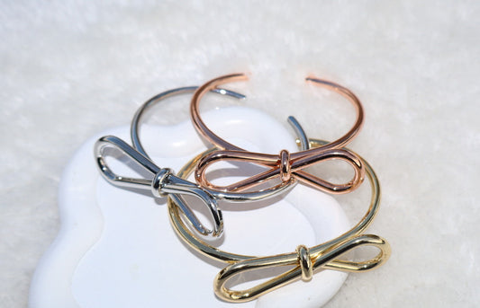 Bow-cuff bracelets